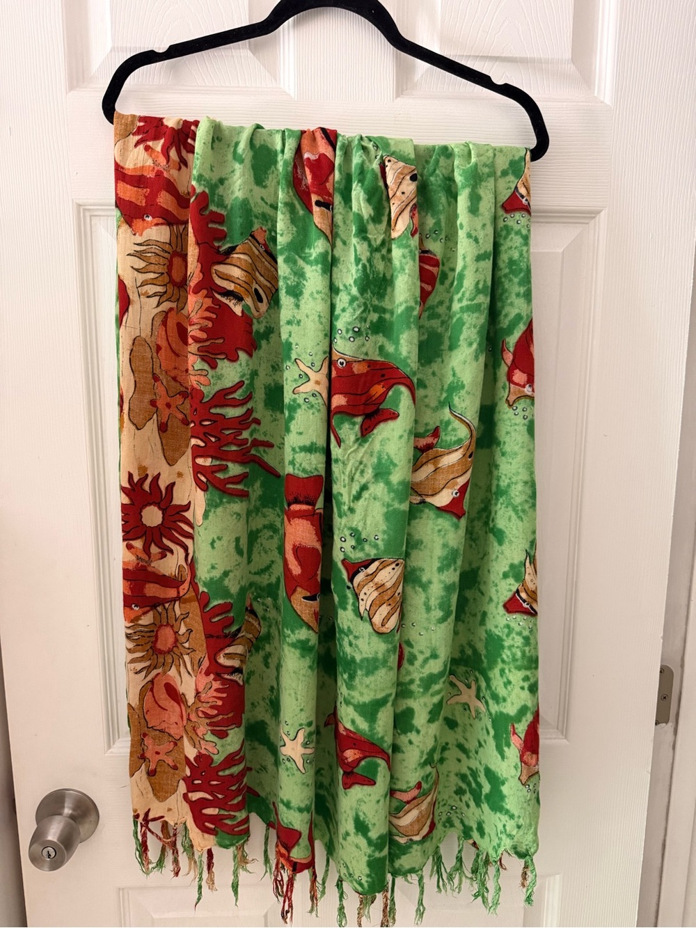 Green sarong a vibrant marine life print of red fish, coral, & starfish & fringe